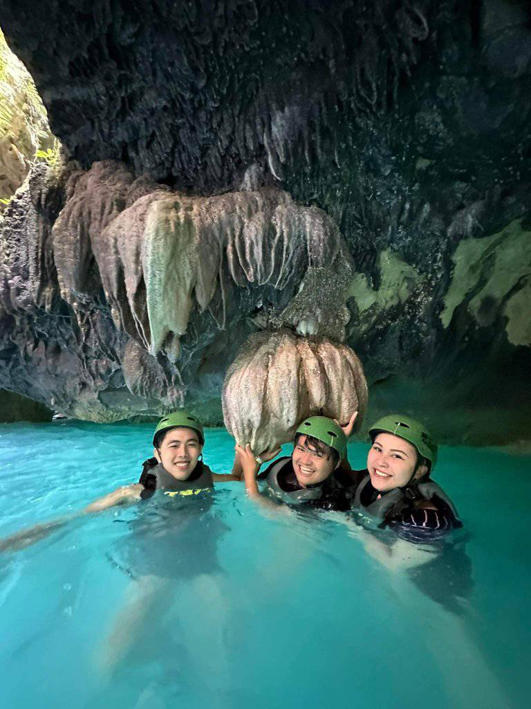 Person swimming with a turtle in Moalboal, Cebu
